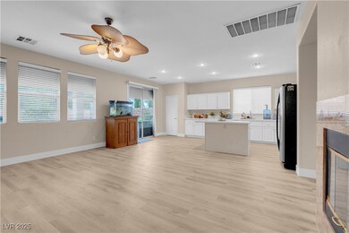 Kitchen featuring freestanding refrigerator, visib