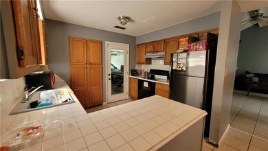 Tile counters and built-in cabinets