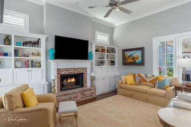 Living room with hardwood / wood-style flooring, a