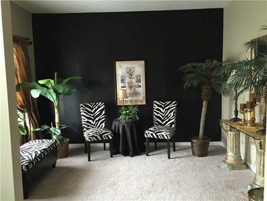 Formal Living Room. formal living room opens to entry way and formal dining room