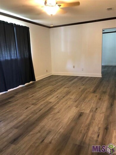 Den or Formal dining area is open to the other Liv
