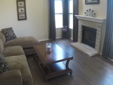 Family Room with fabulous fireplace, vaulted ceili