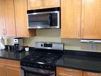 Another view of the kitchen showing the cooking ar
