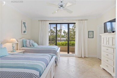 guest bedroom with balcony