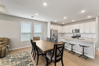 Decorative tray ceilings and recessed lighting.