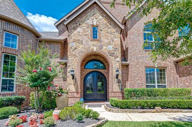 This stunning Toll Brothers home is located on an oversized lot.  The double iron doors adds to the elegance of your new home.