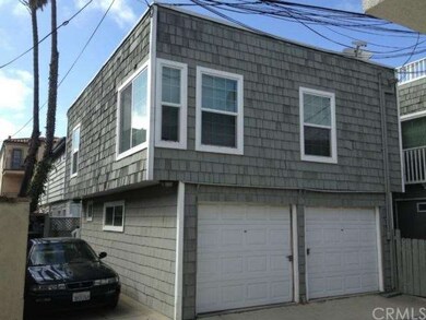 Rear building. Two enclosed garages and 1 uncovere