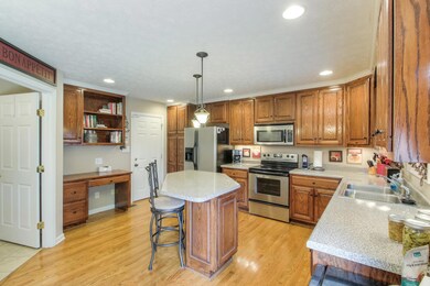 The Kitchen Also Features A Custom Built In Workspace 