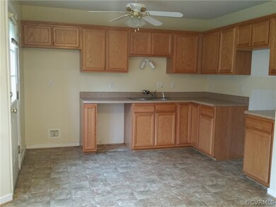 The remainder of the kitchen has ample cabinets as