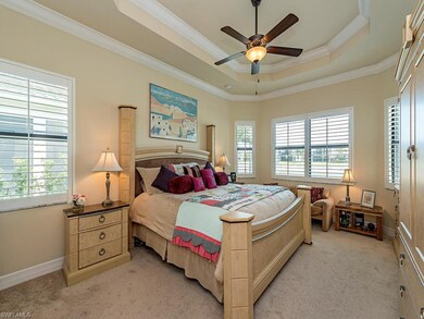 Master Bedroom with Tray Ceiling and Plantation Sh