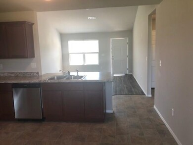 Sample photo of Kitchen and living area.