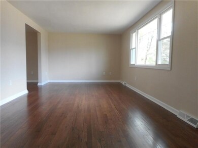 Restored original hardwood floors with a beautiful