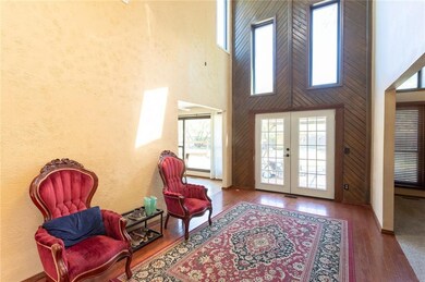 Entry way with french doors leading out to backyar