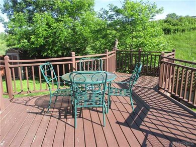 Backyard. SG Doors off kitchen to deck.