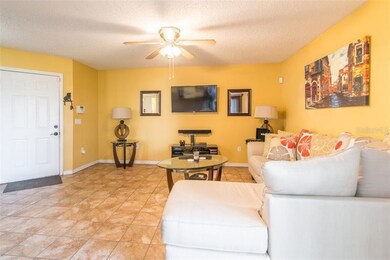 Another view of family room and front door.