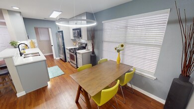 Dining area with baseboards and light wood finish