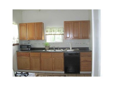 Kitchen. Newer cabinetry, ceramic tile flooring