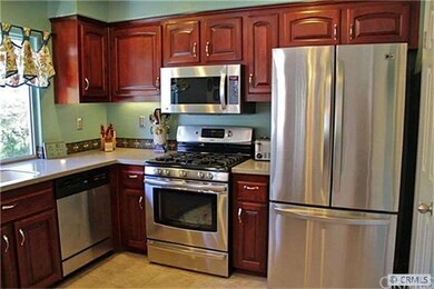 Remodeled Kitchen has Beautiful Corian Counters, M