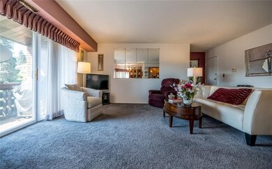Spacious Living Room with Balcony Deck  access