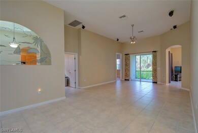 Living room features surround sound and sliding do