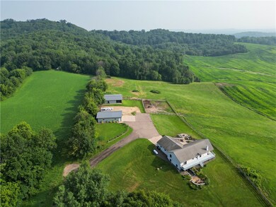 Property includes 19.82 acres offering a nice mix of fenced rolling pasture and woods!