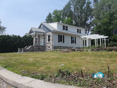 This Beautiful home is set on a double lot.