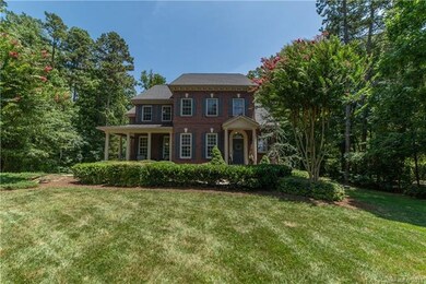 Beautiful full brick home centered in this private
