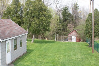 Large back yard with water views of Flint Creek.