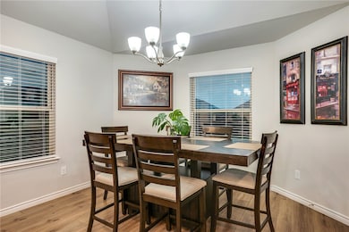 Dining space featuring light wood-style floors, a