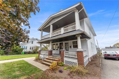 View of front facade with a porch and a front yard