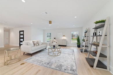 This living room has a bright, airy feel thanks to