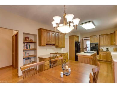 This wonderful kitchen with hardwood floors includ