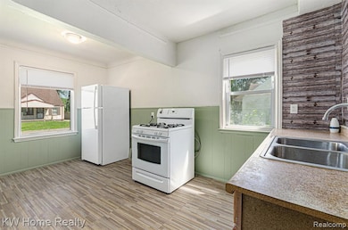 8051 Ashton Ave, Detroit, MI 48228 - photo 7