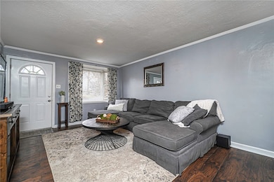 Light and bright living room with large picture wi
