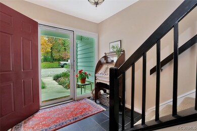 Entrance Foyer is freshly painted with slate floor