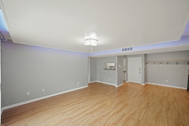 This living area is a large space with a comfortab