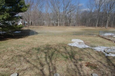Fenced in backyard. There is a...