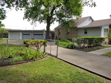 Enjoy a shaded and fenced courtyard under a canopy