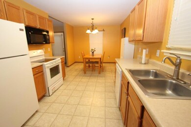 KITCHEN - LOOKING TOWARDS EATING AREA