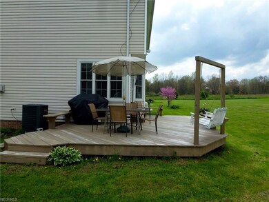 Side view of the wrap around deck with wall of win