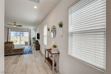 Corridor with visible vents, recessed lighting, li