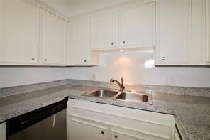 Modern kitchen with sleek countertops, steel appli