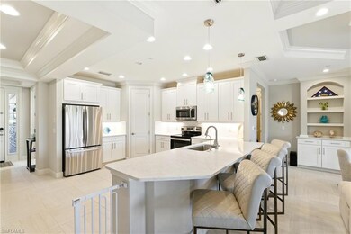 Kitchen with crown molding, ceiling fan, a sink, o