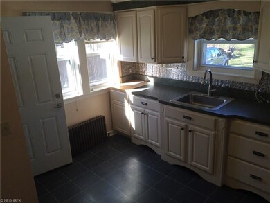 Kitchen walks out to side entrance.