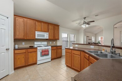 Open kitchen floorplan with breakfast bar, gas stove/oven, plenty of cabinets, large pantry, etc.