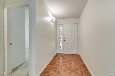 Wood in entry foyer.