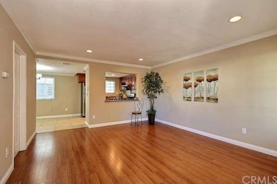 Living room overlooking the kitchen and dining are