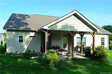 Back of Home- Covered Patio & Garden Area
