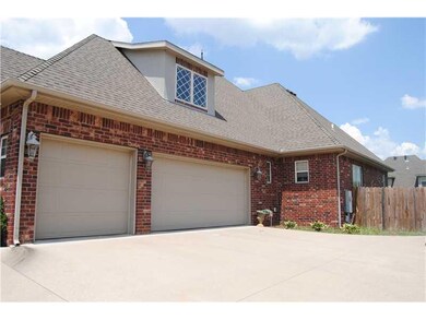 Exterior Front. Side load garage on a huge lot!