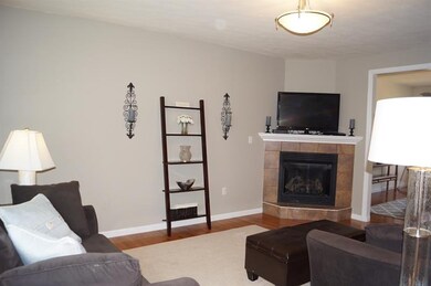 Nice size living space with newly painted gray wal